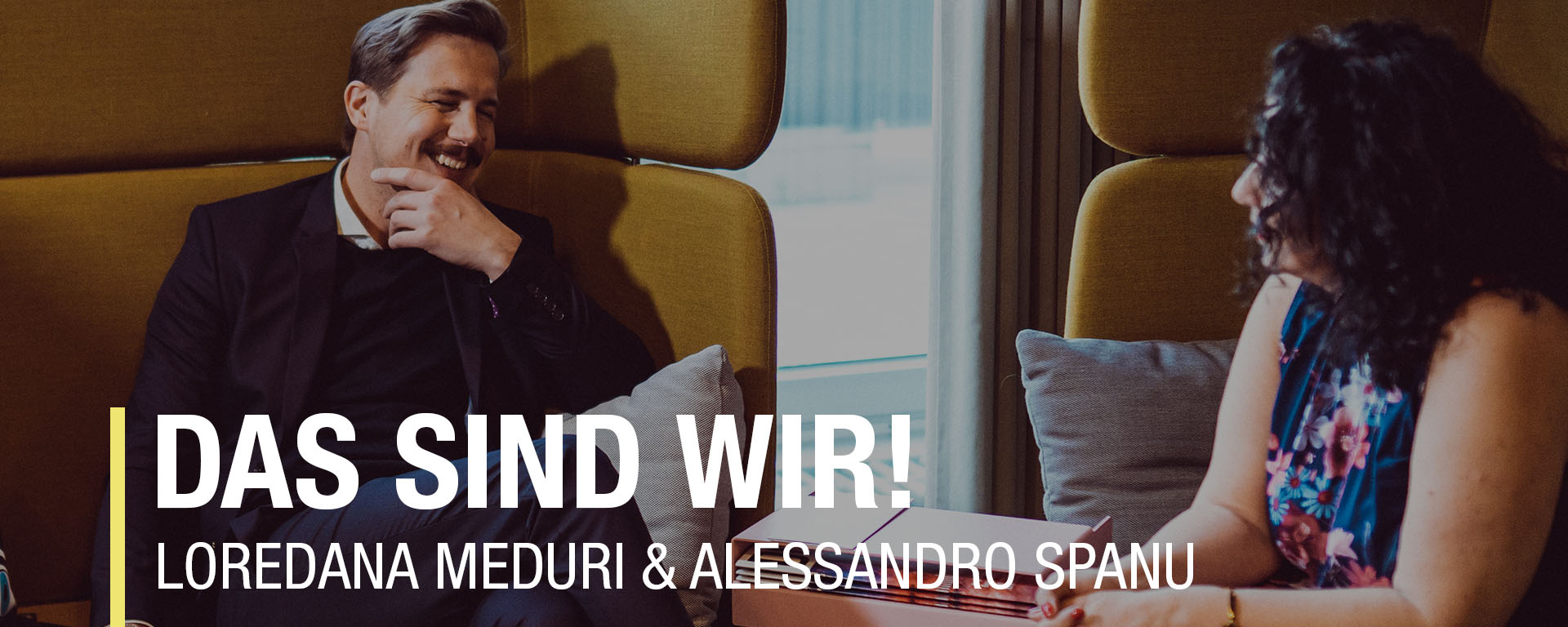 Loredana Meduri und Alessandro Spanu präsentieren sich in einer modernen Umgebung und zeigen ihre Zusammenarbeit.